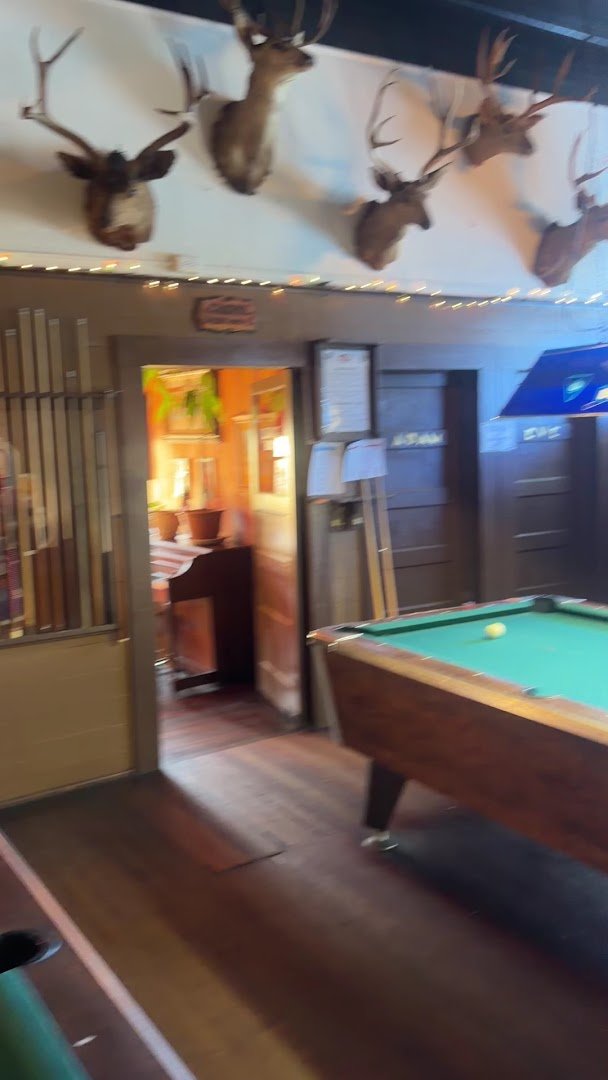 Dim dining room with a relaxed pub feel.
